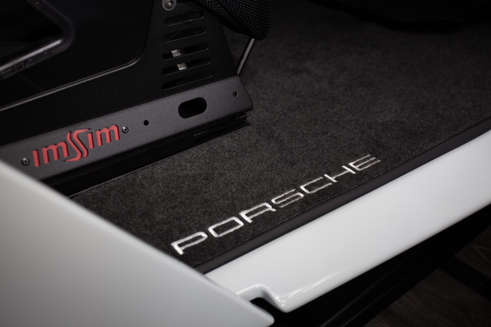 Floor mat with ImSim and Porsche lettering