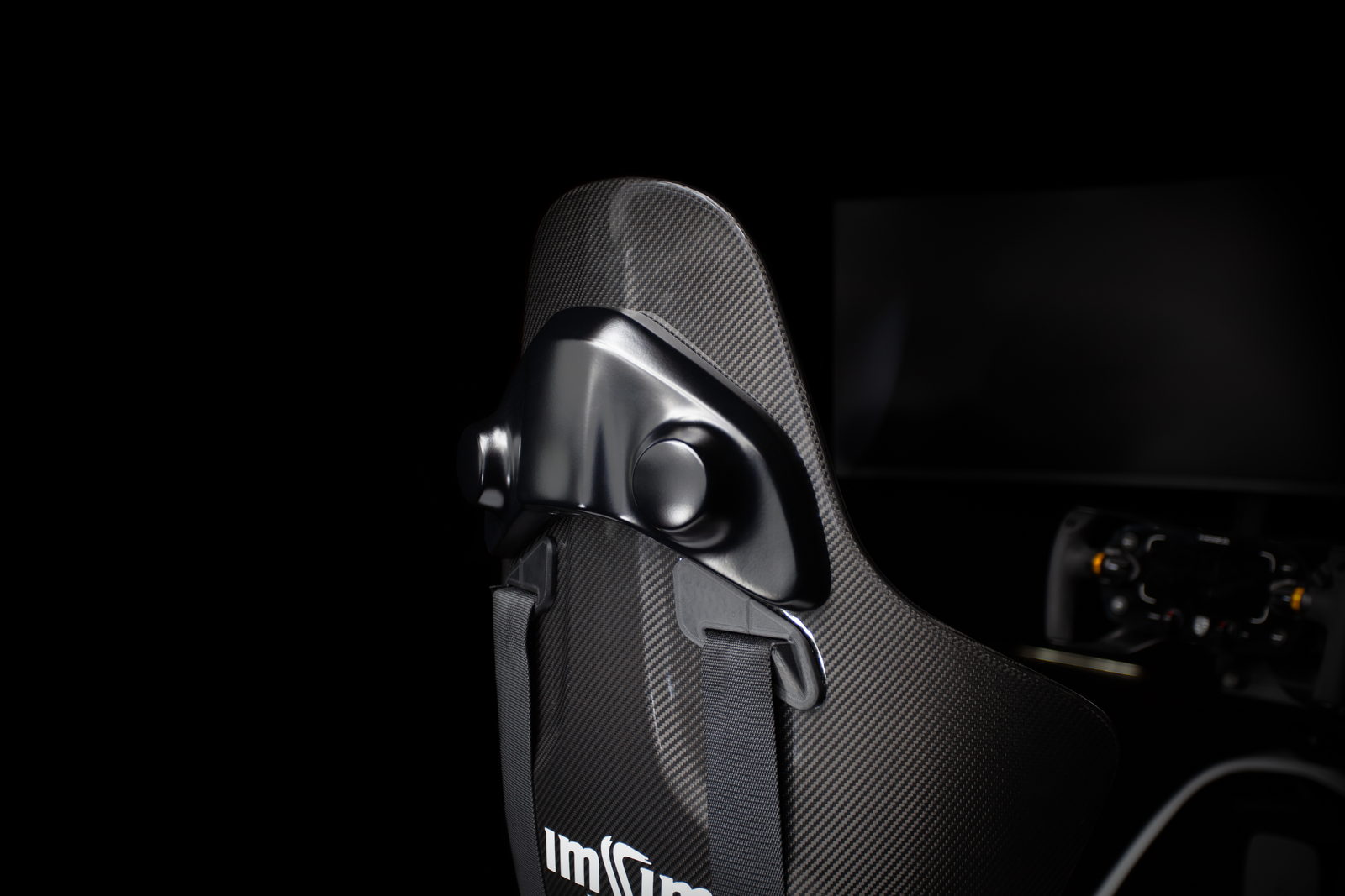 Carbon fibre racing seat with harness